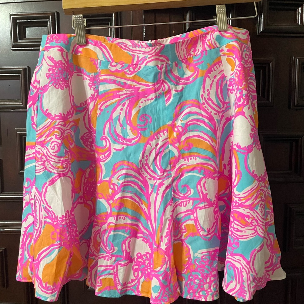 Lilly Pulitzer cheerleader, style skirt.